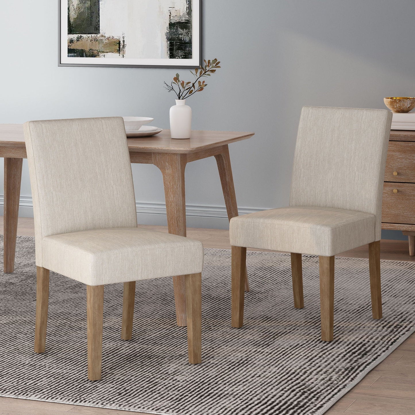 Contemporary Dining Chair with Upholstered Seating and Tapered Legs