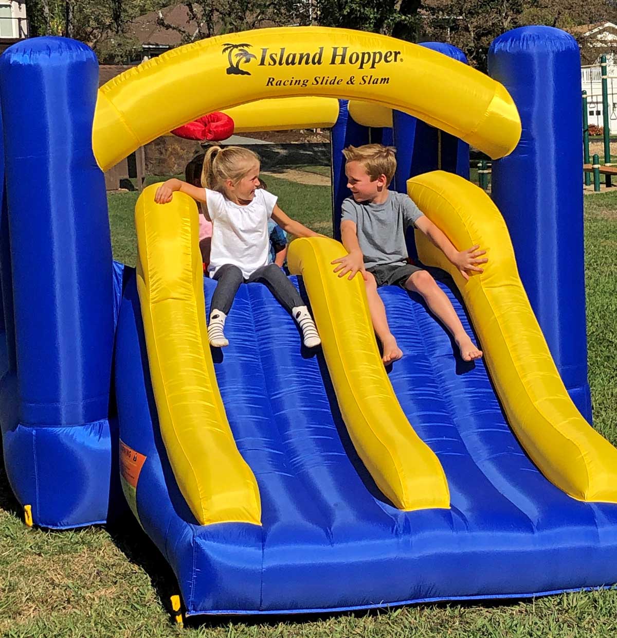 Island Hopper Racing Slide and Slam Bounce House