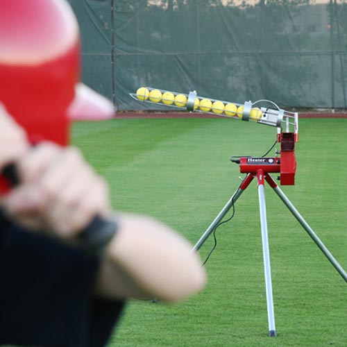 Heater Real Baseball Pitching Machine w/ Feeder & Xtender 24' Batting Cage