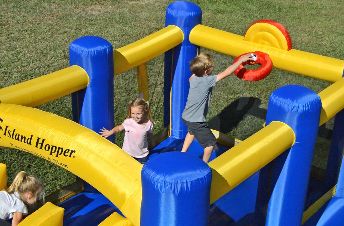 Island Hopper Racing Slide and Slam Bounce House